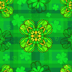 Seamless vector decorative pattern with boho shamrocks in Irish colors. St. Patrick's Day. Wrapping. Celtic green texture, tartan.