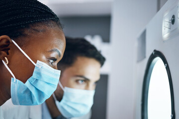 Science, researchers and incubator for experiment, healthcare and medical breakthrough in...
