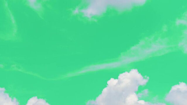 The green screen of moving white clouds with 4K resolution. Can use to change the background color.	
