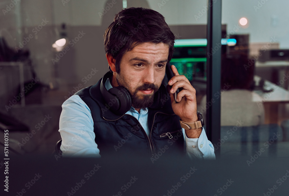 Leinwandbilder Programmer, phone call and man talking, thinking or chatting and speaking to contact at night office. Information technology, idea and male coder with mobile for networking while looking at computer.