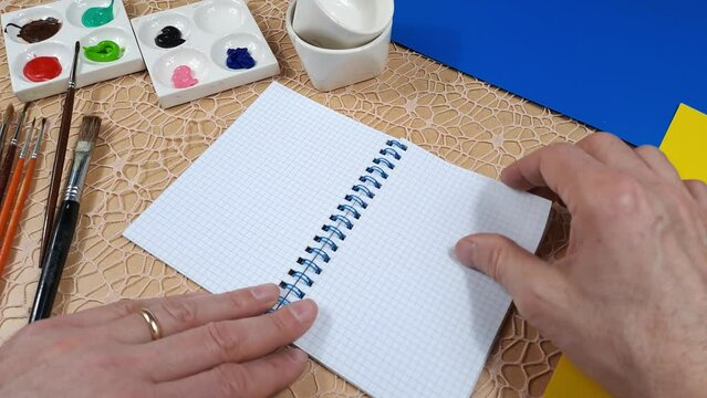 Workplace Of Artist Drawing Activity, Sketch Pad. Artist Turns Pad Pages And Shows Close Up. Drawing Art Product Artist, Sketch..