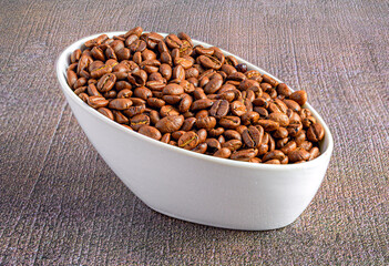 coffee beans in an earthenware container