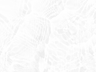 Defocus blurred transparent white colored clear calm water surface texture with splashes and bubbles. Trendy abstract nature background. Water waves in sunlight with copy space. White water shine