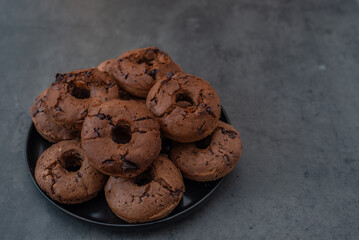 sweet home made chocolate chip donuts on a table