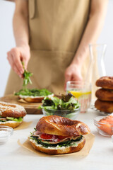 Concept of delicious food - tasty bagel sandwich