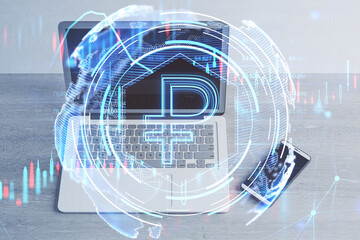 Close up of laptop and cellphone on desktop with glowing ruble hologram on blurry office background. Money, digital banking and finance concept. Double exposure.