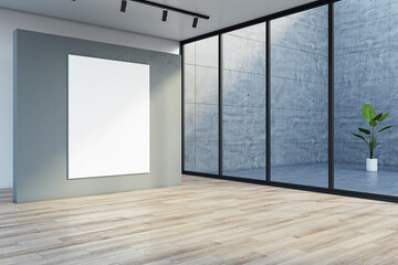 Blank white poster with space for your logo or text on grey partition in empty sunlit exhibition hall with light ceiling and green plant background behind glass wall. 3D rendering, mock up