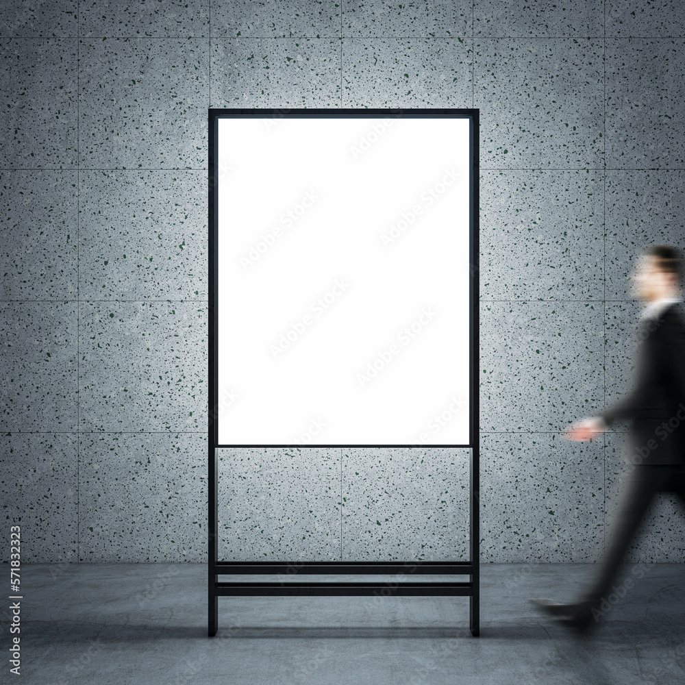 Poster advertising concept with side view on blurred businessman walking by blank whiteboard with space for