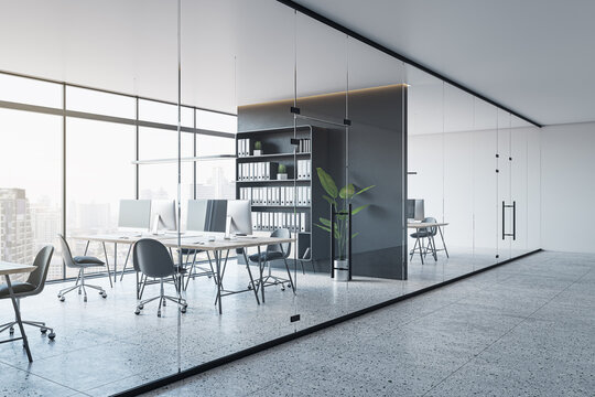 Modern glass office interior with concrete flooring, furniture, window with city view and other objects. 3D Rendering.