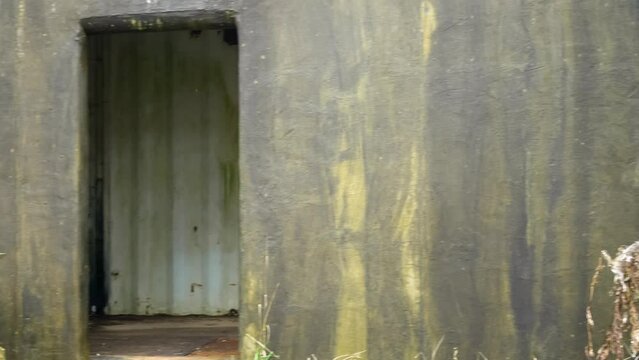 inside a mock army village house and courtyard