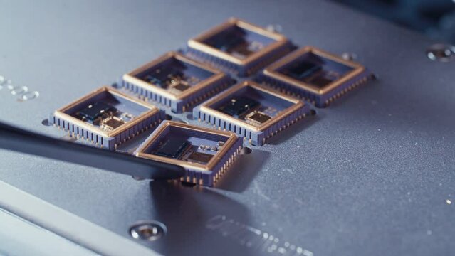 Technician placing microship on a wire bonder