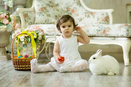Beautiful girl with a Easter Bunny.