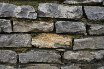 stone wall, stones aged gray color