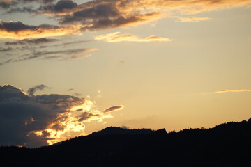 Beautiful colorful sunset over the mountains in Schladming with view to distinctive famous Dachstein mountain in Styria, Austria