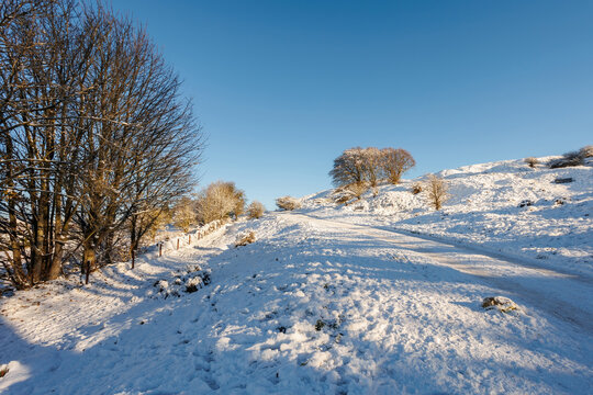 Snow covered wintery scenes of Cleeve Hill on The Cotswold Way, Cheltenham, Gloucestershire

