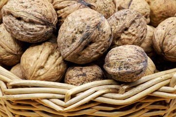 organic shelled walnuts in a wicker basket