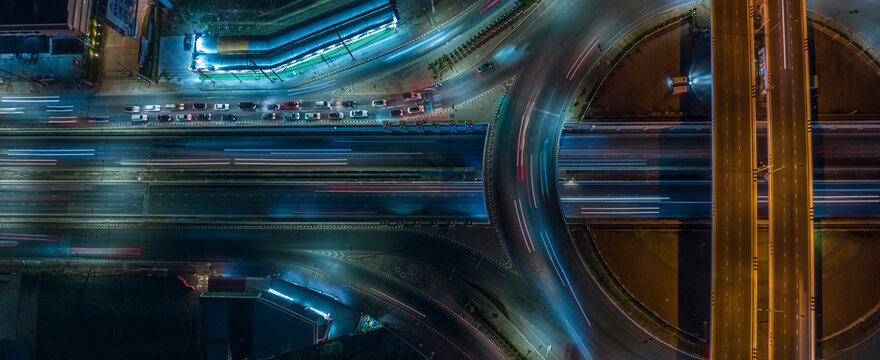 Panoramic view of Public transport or commuter city life concept , expressway car traffic transportation above circle roundabout road	