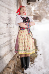 slovak folk costume. Young beautiful slovak woman in traditional dress. Slovak folklore