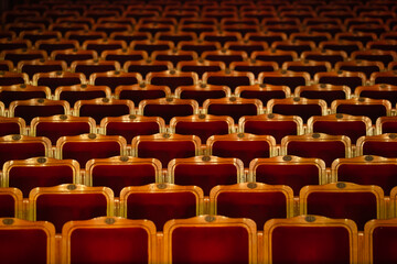 Fototapeta premium Row of red seats in theatre