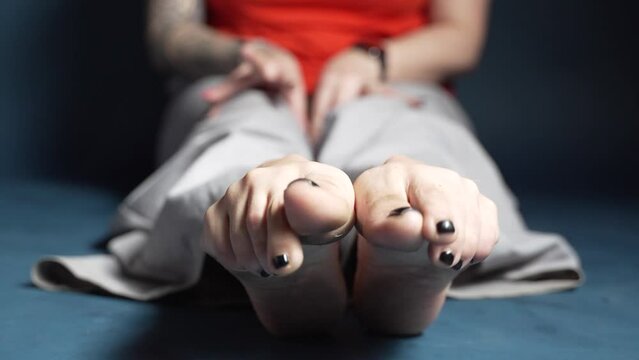 Female Showing Off Dirty Soles of Feet to Camera