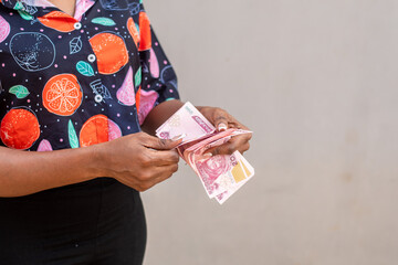 a lady counting her money