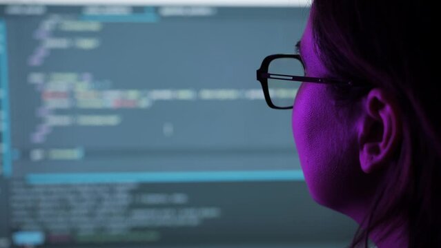 Engineer developing software app using laptop typing code on screen, programmers coding internet security system, designing artificial intelligence project.