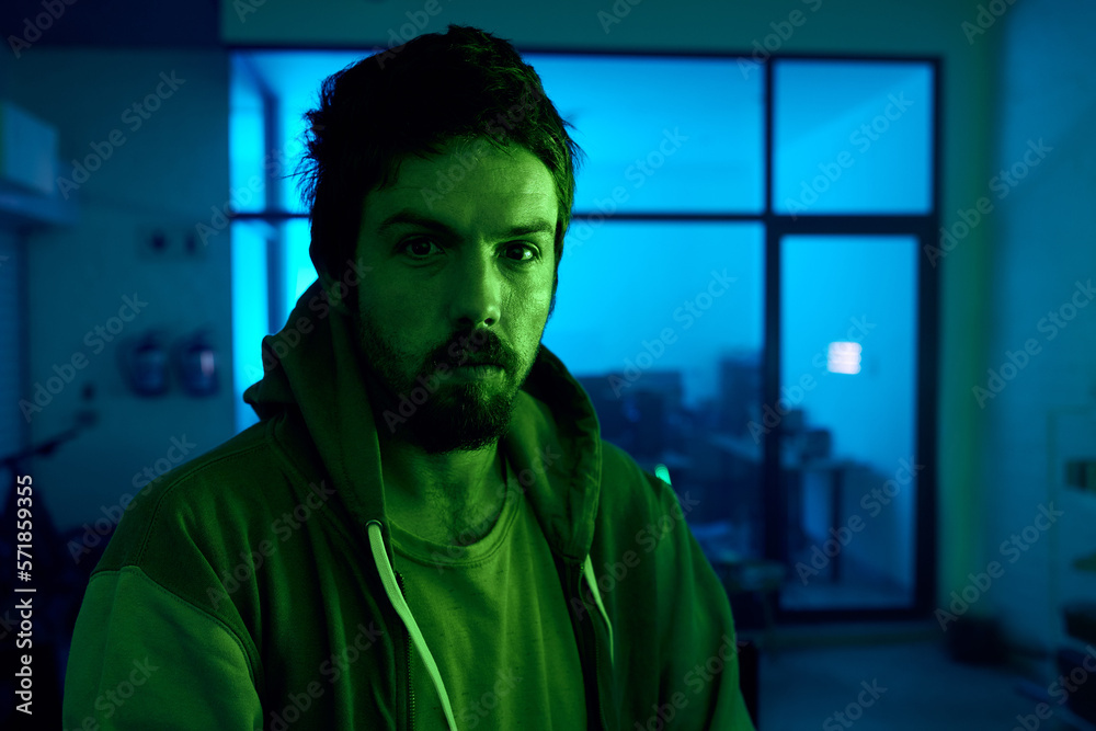 Poster Man, portrait and criminal in dark neon garage with cybersecurity vision, software programming thinking or phishing. Hacker, face and night clothes for secret virus ideas of fraud scam or innovation