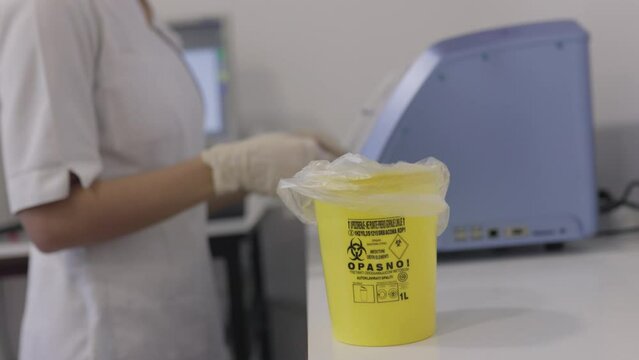 Throw away the medicine in the trash. Disposal container for Infectious waste, reducing medical waste disposal. Small Medical Waste sharps container with sharps for bio-hazard.