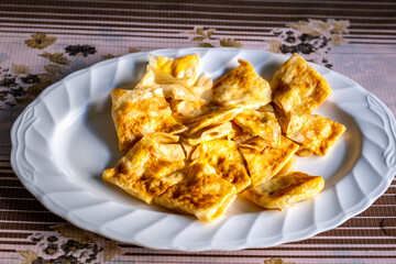 Thai dessert style, Top view of crispy roti stuffed with egg on street food, Ready to eat or serve.
