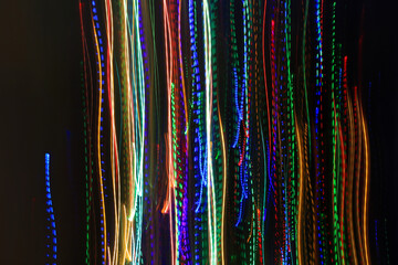Abstract blurry background from colorful traces of lights