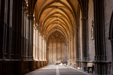 Ornate gothic cloister arcade arches of the Catholic, Pamplona
