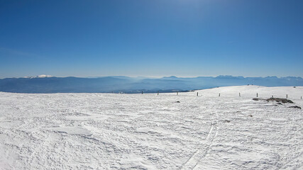 Scenic view of snow covered alpine meadows and Koralpe mountains seen from Ladinger Spitz, Saualpe,...