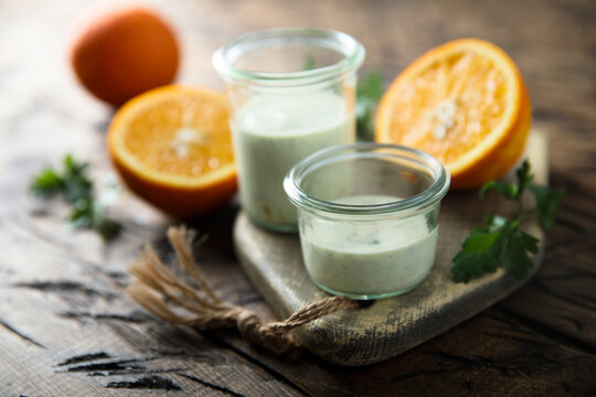Homemade salad dressing with yogurt and zest