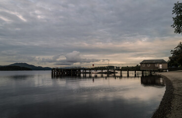 Fototapeta premium Sunset over Loch Lomond, Scottish Highlands, UK