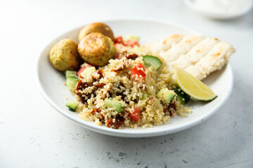 Falafel with warm couscous salad