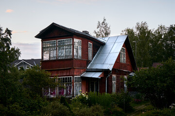 Red wooden house in the Russian village