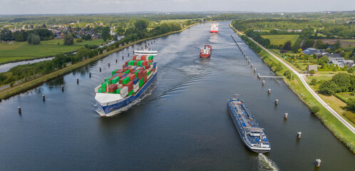 Ship traffic on the Kiel Canal or Nord-Ostsee-Kanal near Rendsburg, Schleswig-Holstein, Germany....