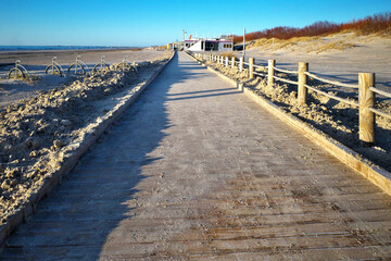 Wooden pavement cleared of sea sand.