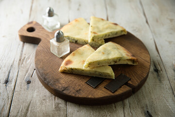 Homemade pie with cheese and herbs