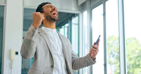 Success, phone and winner with businessman in office and celebration for deal, growth and stock...