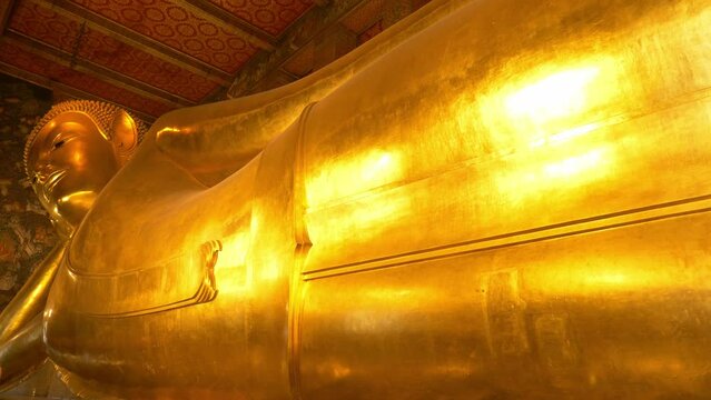 golden Buddha statue, Thailand temple of Wat Pho in Bangkok, famous Reclining Buddha sculpture, Thai culture, Buddhist sacred landmark 