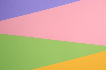 Colorful sheets of paper as background, top view