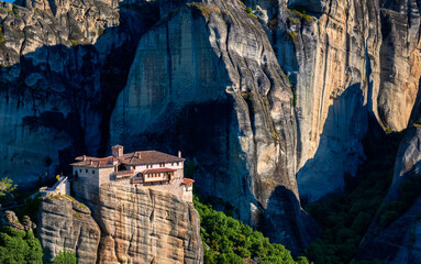 Fototapeta na wymiar Close view of cliff top Moni Agias Varvaras Roussanou nunnery, hills