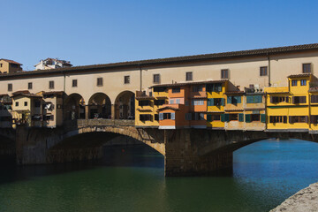 Ponte Vecchio, the famous medieval bridge over the Arno River, in Florence, Italy
