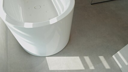 A modern Italian minimalist bathroom in pristine white. Clean lines and neutral tones create a spa-like atmosphere, perfect for relaxation and rejuvenation