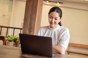 woman work using computer hand typing laptop keyboard contact us.student study learning education online.adult professional people chatting search at office.concept for technology device business