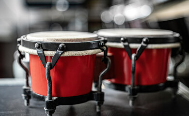 Red drums in recording studio for hard beat perfomance. Professional musical instrument for rock...
