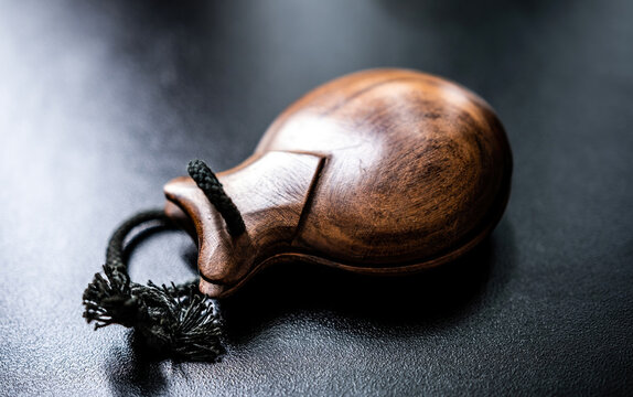 Wooden castanet for flamenco dance closeup. Traditional hispanic musical instrument for live perfomance