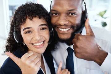 Call center selfie, business people and thumbs up with smile for teamwork, motivation and success in crm job. Black man, woman and yes hand sign for social media, team building and consulting goals