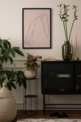 Creative composition of living room interior with mock up poster frame, black sideboard, glass vase...